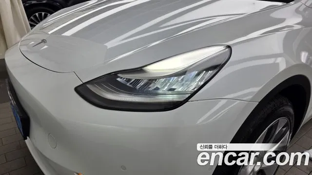 Tesla Model Y — Фото автомобиля 22