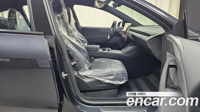 Tesla Model Y — Фото автомобиля 25