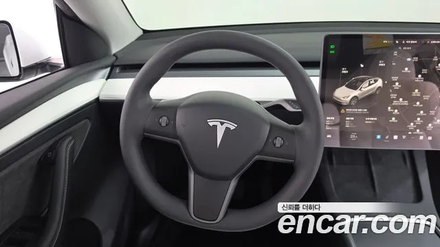 Tesla Model Y — Фото автомобиля 12