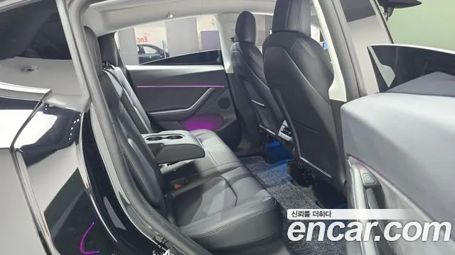 Tesla Model Y — Фото автомобиля 11