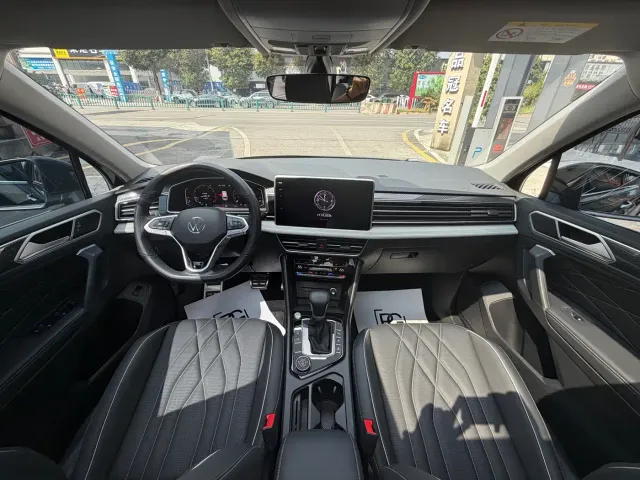 Volkswagen Tiguan L — Фото автомобиля 5