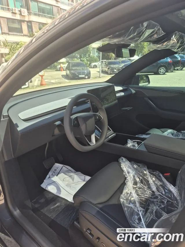 Tesla Model Y — Фото автомобиля 7
