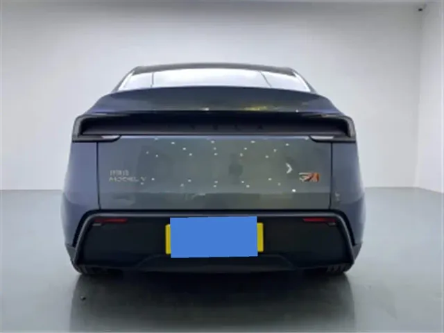 Tesla Model Y — Фото автомобиля 6