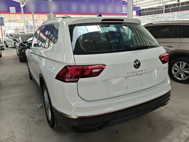 Volkswagen Tiguan L — Фото автомобиля 4