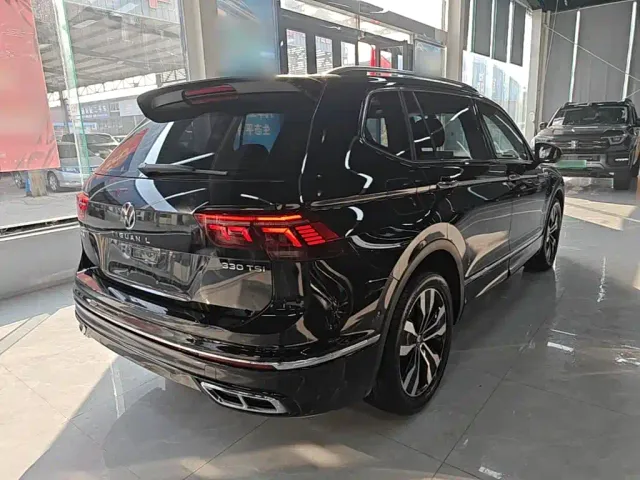 Volkswagen Tiguan L — Фото автомобиля 6