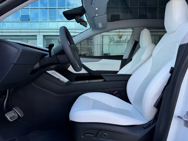 Tesla Model Y — Фото автомобиля 19