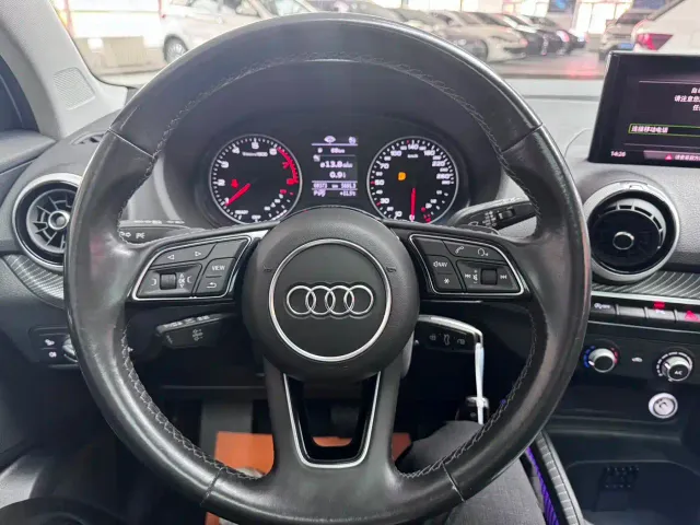 Audi Q2L — Фото автомобиля 11