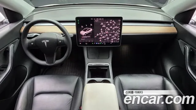 Tesla Model Y — Фото автомобиля 7