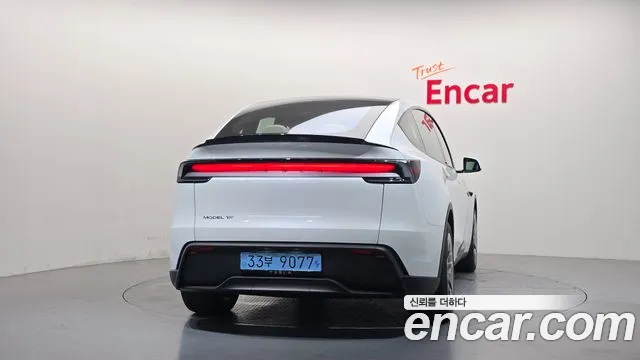 Tesla Model Y — Фото автомобиля 4