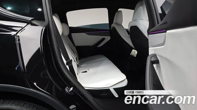 Tesla Model Y — Фото автомобиля 12