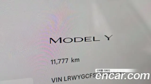 Tesla Model Y — Фото автомобиля 11