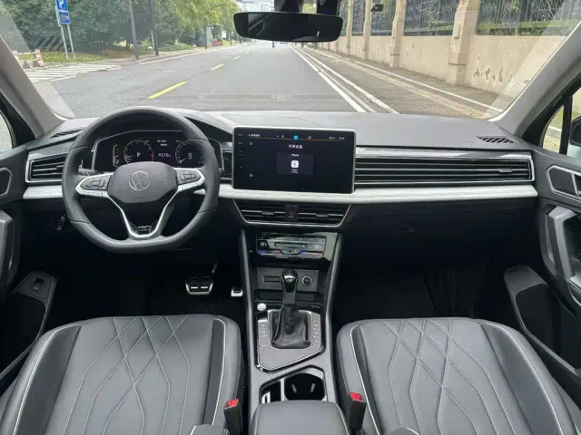 Volkswagen Tiguan L — Фото автомобиля 9