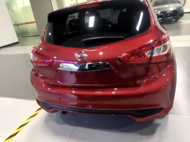 Nissan Tiida — Фото автомобиля 5