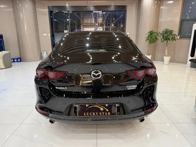 Mazda Axela — Фото автомобиля 5