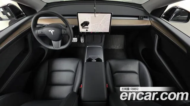 Tesla Model Y — Фото автомобиля 10