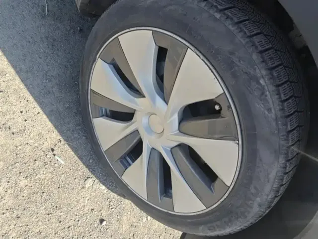 Tesla Model Y — Фото автомобиля 6