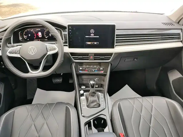 Volkswagen Tiguan L — Фото автомобиля 9