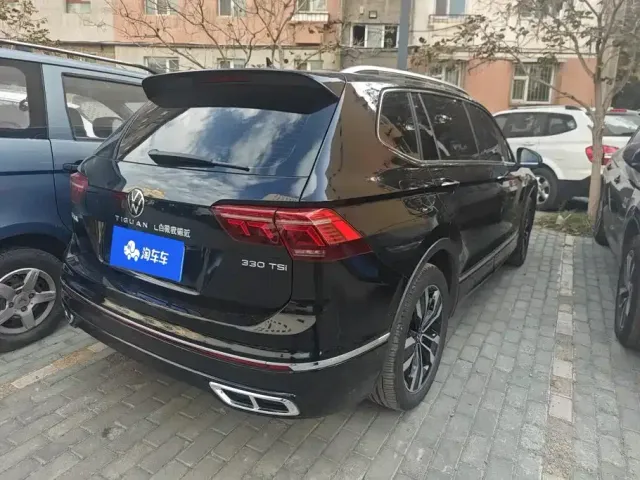 Volkswagen Tiguan L — Фото автомобиля 3
