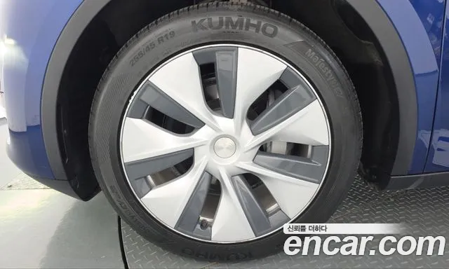 Tesla Model Y — Фото автомобиля 5