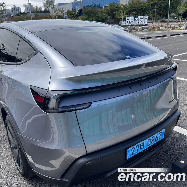 Tesla Model Y — Фото автомобиля 7