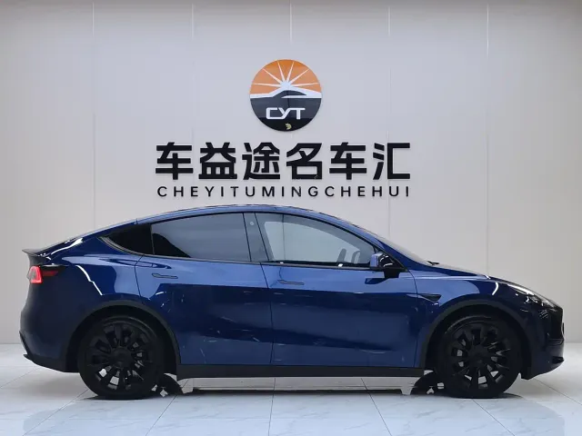 Tesla Model Y — Фото автомобиля 25