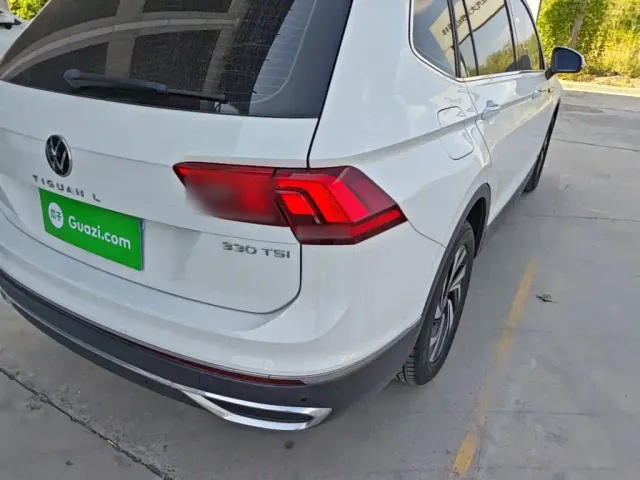 Volkswagen Tiguan L — Фото автомобиля 7
