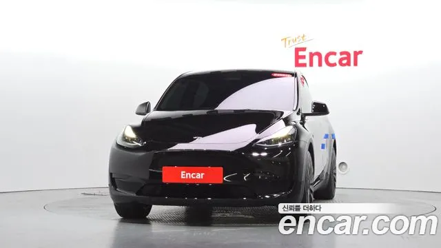 Tesla Model Y — Фото автомобиля 3