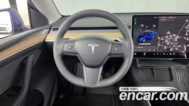 Tesla Model Y — Фото автомобиля 19