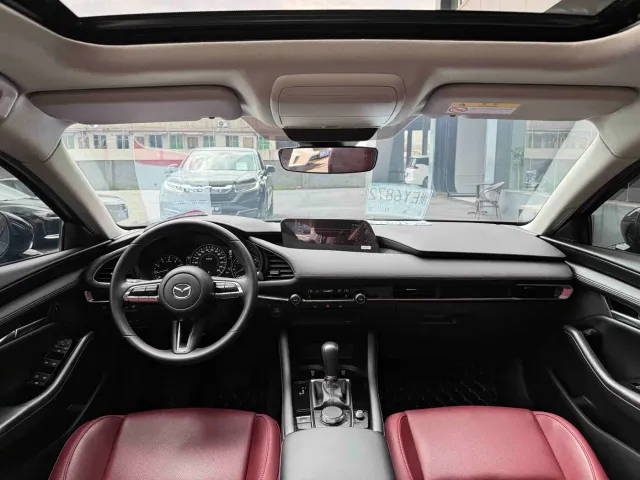 Mazda Axela — Фото автомобиля 5