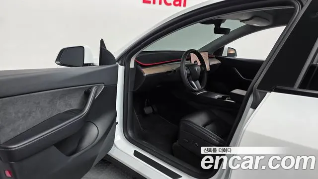 Tesla Model Y — Фото автомобиля 10