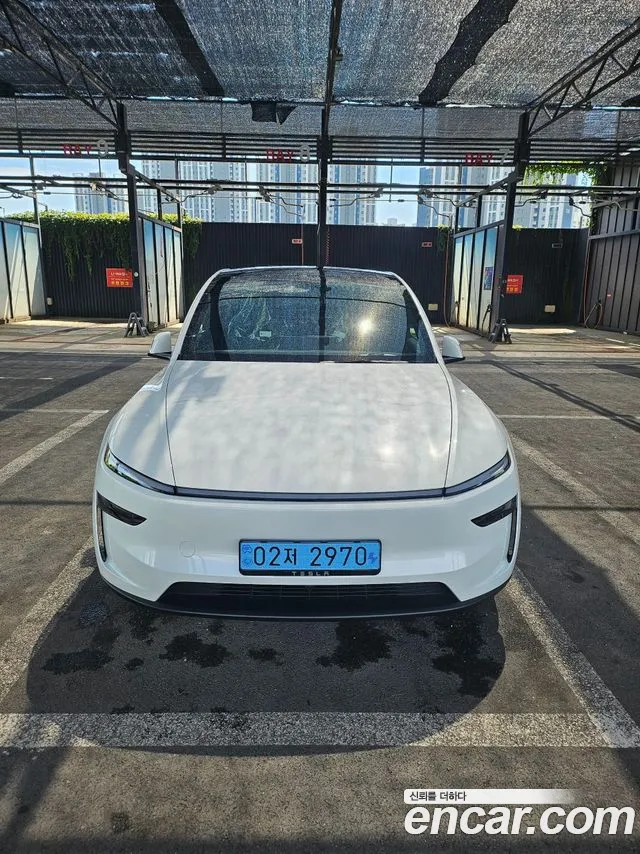 Tesla Model Y — Фото автомобиля 7