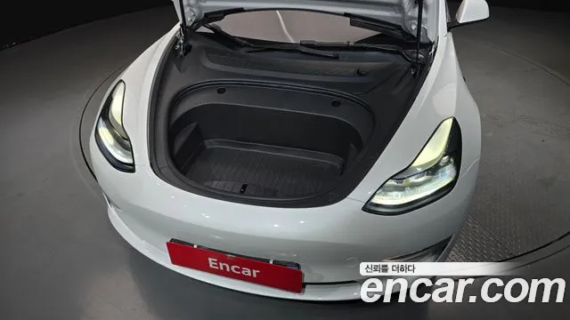 Tesla Model 3 — Фото автомобиля 6