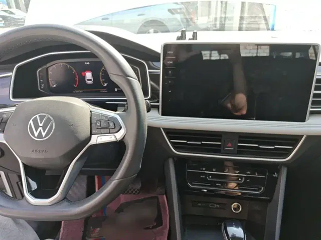 Volkswagen Tiguan L — Фото автомобиля 9