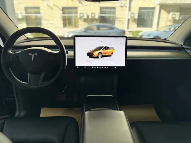 Tesla Model Y — Фото автомобиля 6
