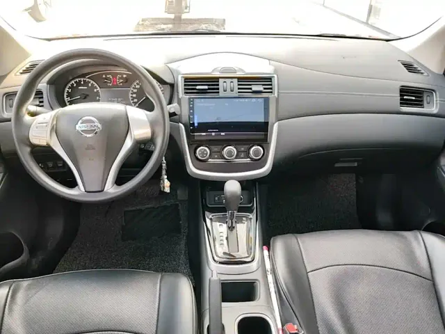 Nissan Tiida — Фото автомобиля 9