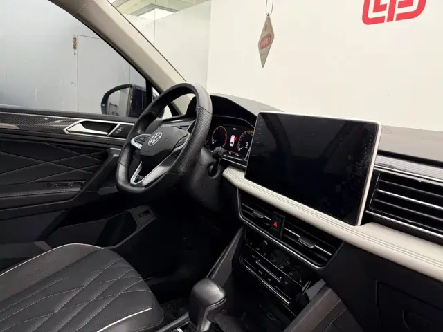 Volkswagen Tiguan L — Фото автомобиля 16