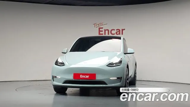 Tesla Model Y — Фото автомобиля 3