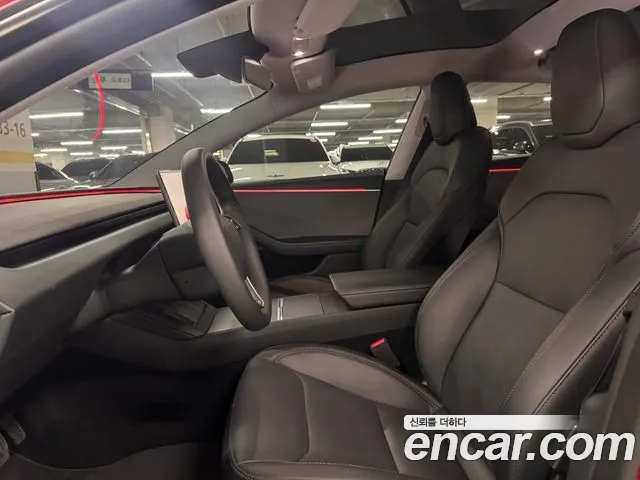 Tesla Model 3 — Фото автомобиля 12