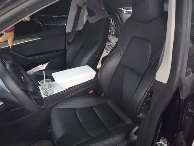 Tesla Model Y — Фото автомобиля 13