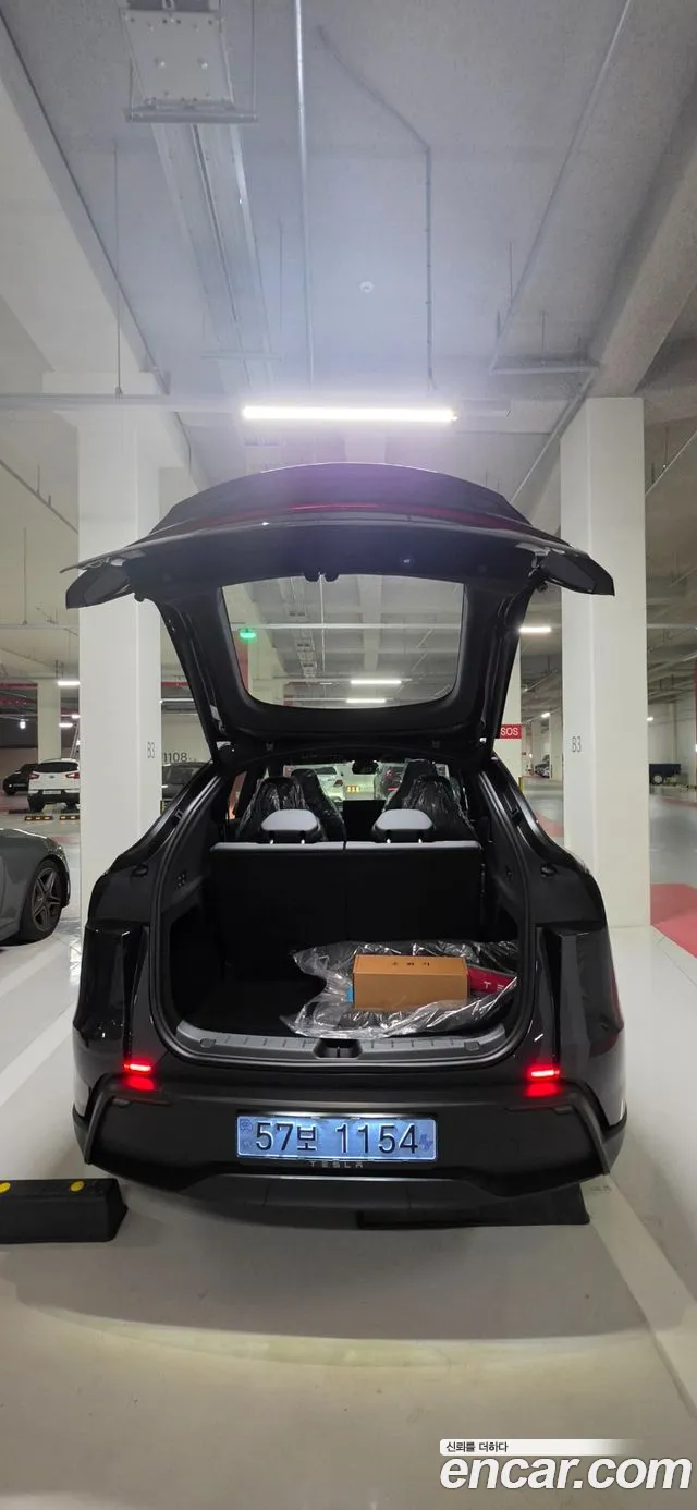 Tesla Model Y — Фото автомобиля 19