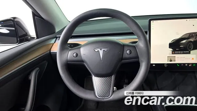 Tesla Model Y — Фото автомобиля 12