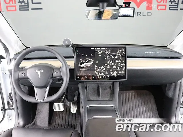 Tesla Model Y — Фото автомобиля 15