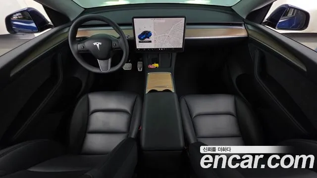 Tesla Model Y — Фото автомобиля 7