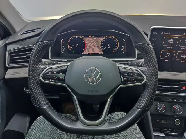 Volkswagen Tiguan L — Фото автомобиля 11