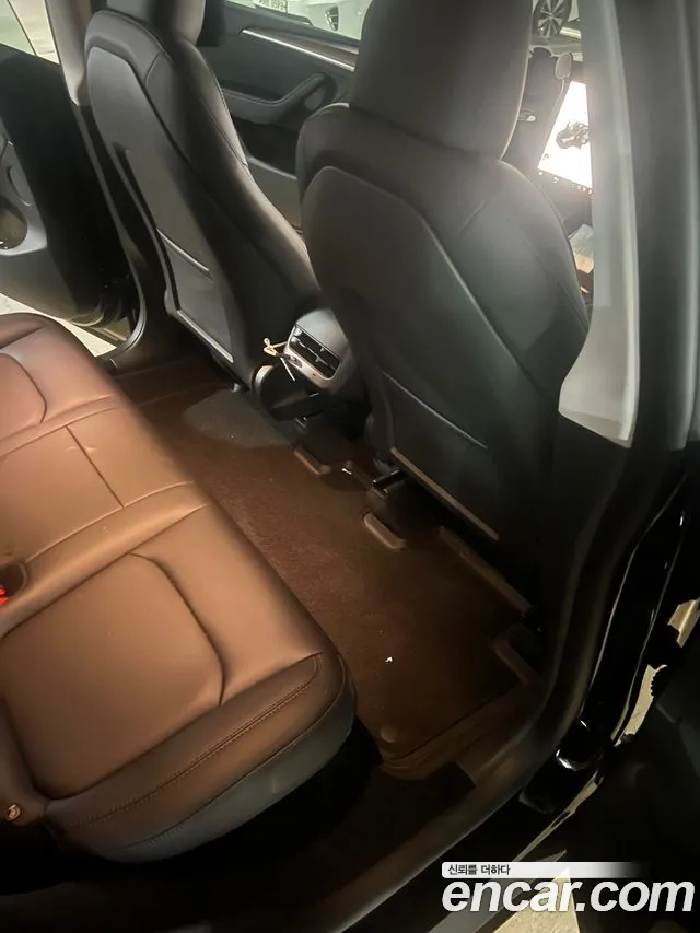 Tesla Model Y — Фото автомобиля 17