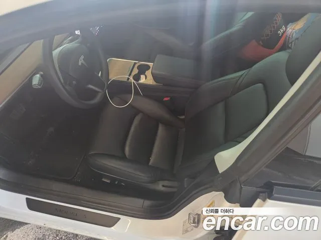 Tesla Model 3 — Фото автомобиля 2