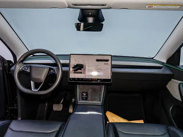 Tesla Model Y — Фото автомобиля 7