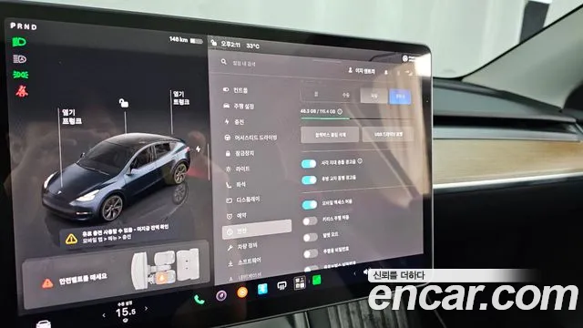 Tesla Model Y — Фото автомобиля 16