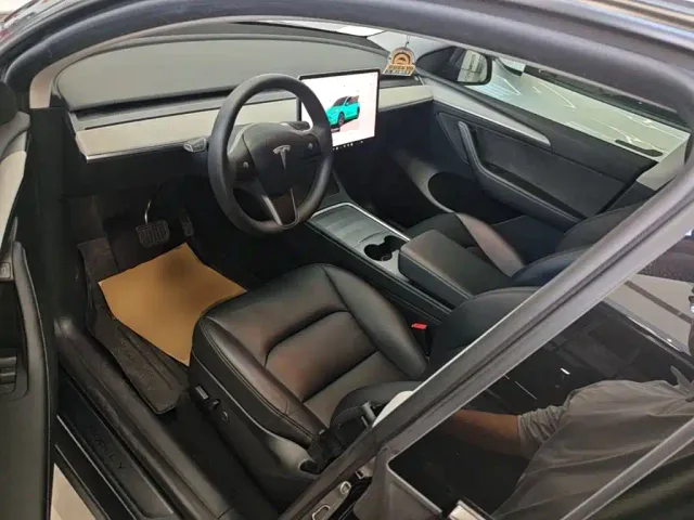 Tesla Model Y — Фото автомобиля 15
