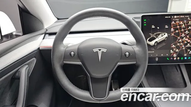 Tesla Model Y — Фото автомобиля 17